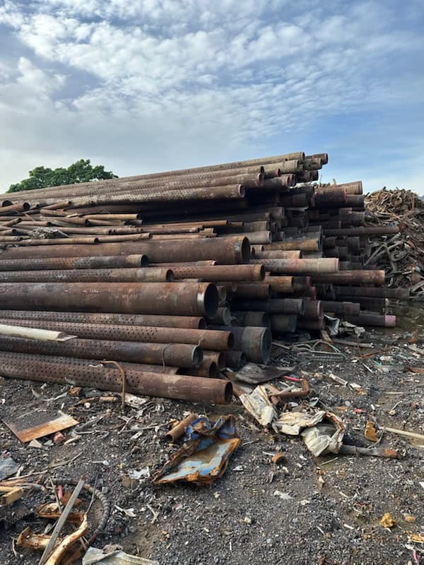 Steel scrap metal pile for recycling and trading purposes.