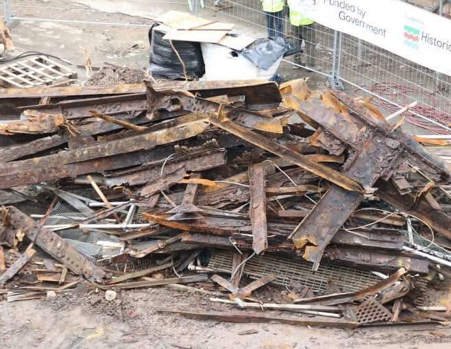 Pile of rusted scrap metal ready for recycling services.