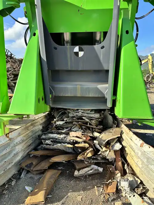 Heavy-duty scrap metal shredder for industrial recycling.